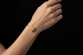 Gold Bar Bracelet on Woman's Hand