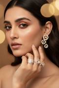 Woman wearing gold diamond circular earrings lifestyle photo